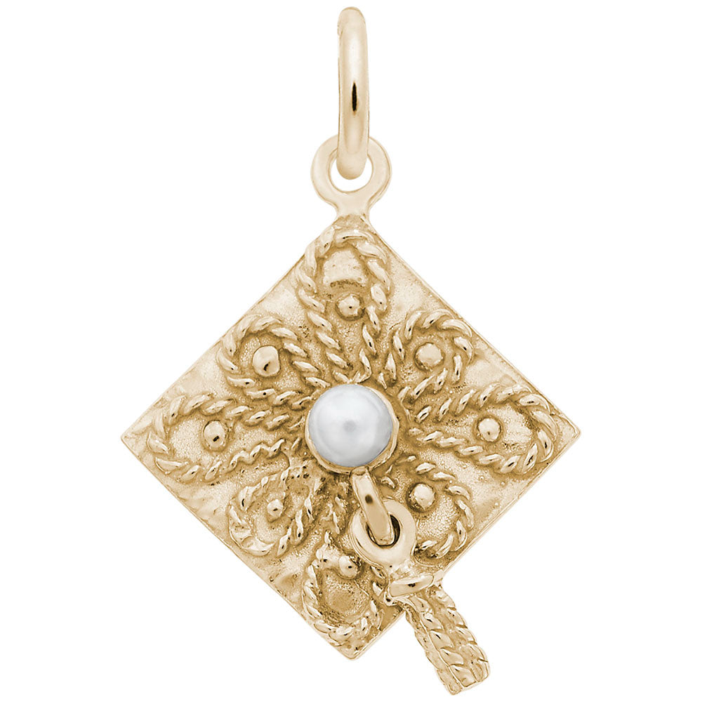 Silver grad cap charm with intricate designs and a pearl on a white background