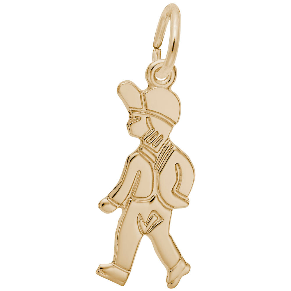 Gold charm of a boy walking on a white background