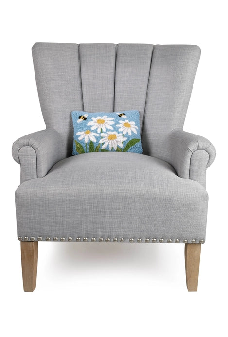 Daisies & Bees Hook Pillow on grey chair