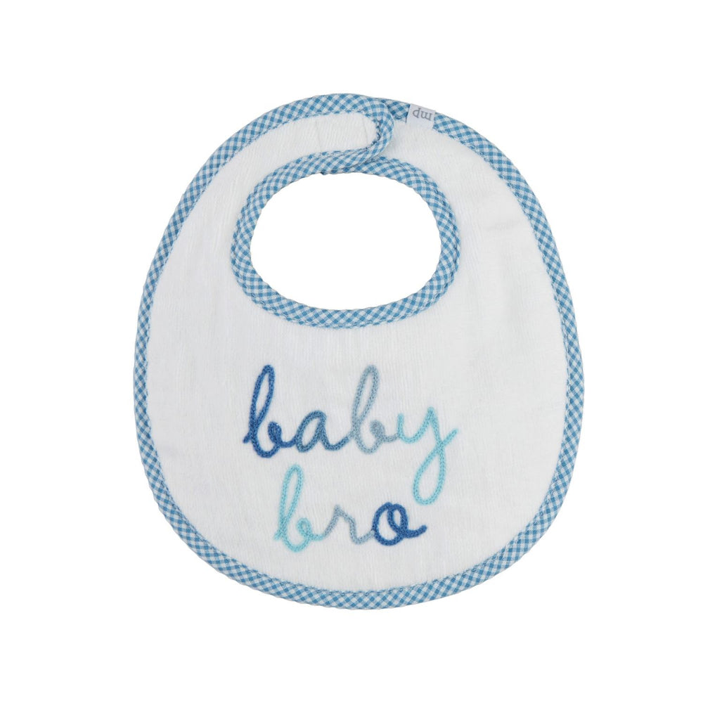 A white and blue embroidered bib with the text 'baby sis' on it, with a hook and loop closure at the back.