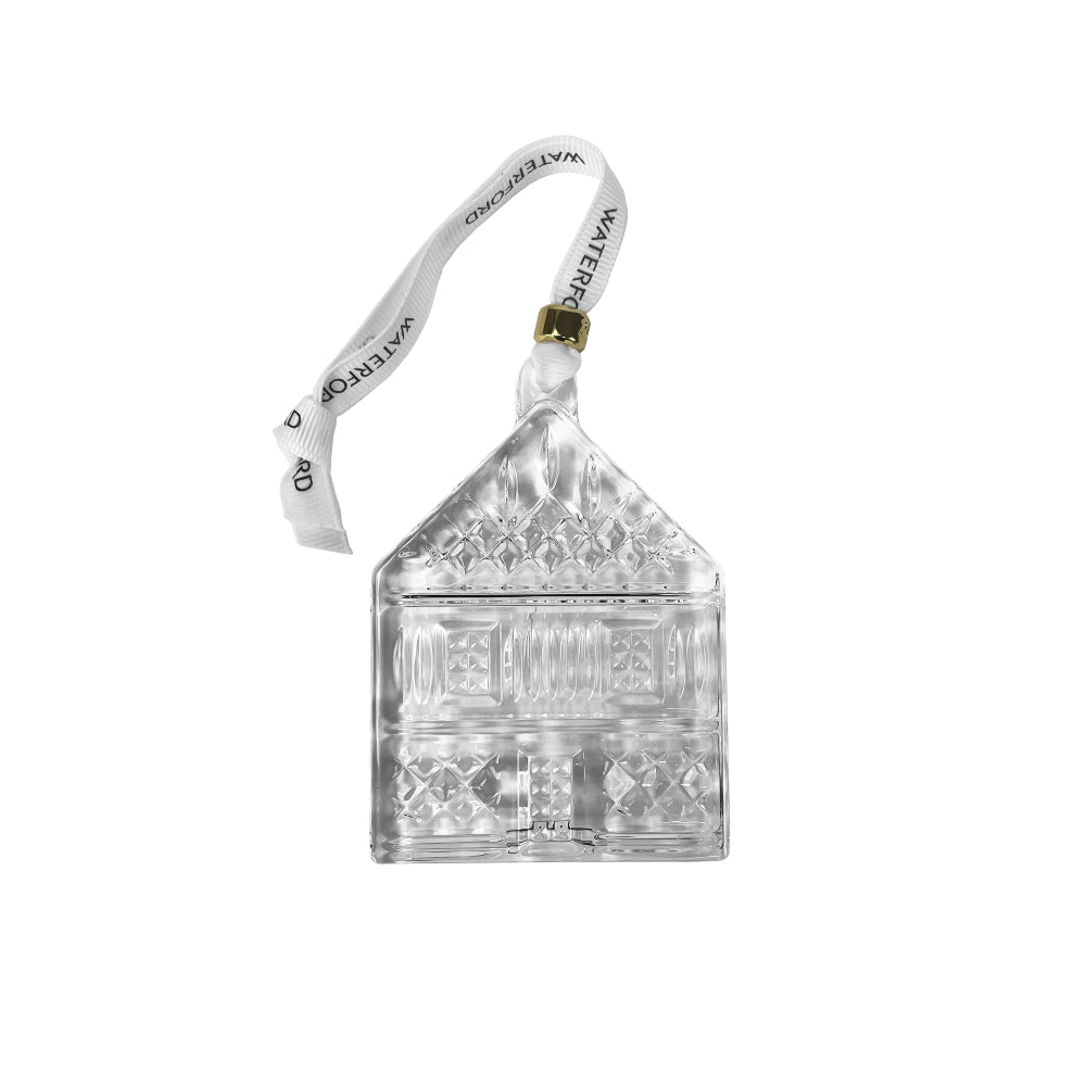 Crystal 2026 Waterford My First Home ornament with a gold cuff on the hanging loop engraved with "2026 on a white backround.