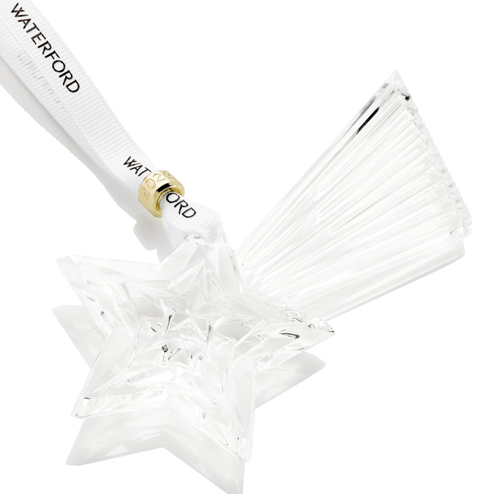 Clear crystal snowstar ornament with gold accent and Waterford branding on a white background