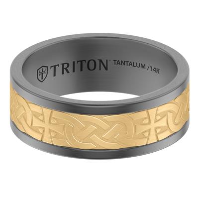 A titanium ring band with a dark gray finish and a gold-colored Celtic knot inlay, featuring the brand name 'TRITON' engraved on the inside.