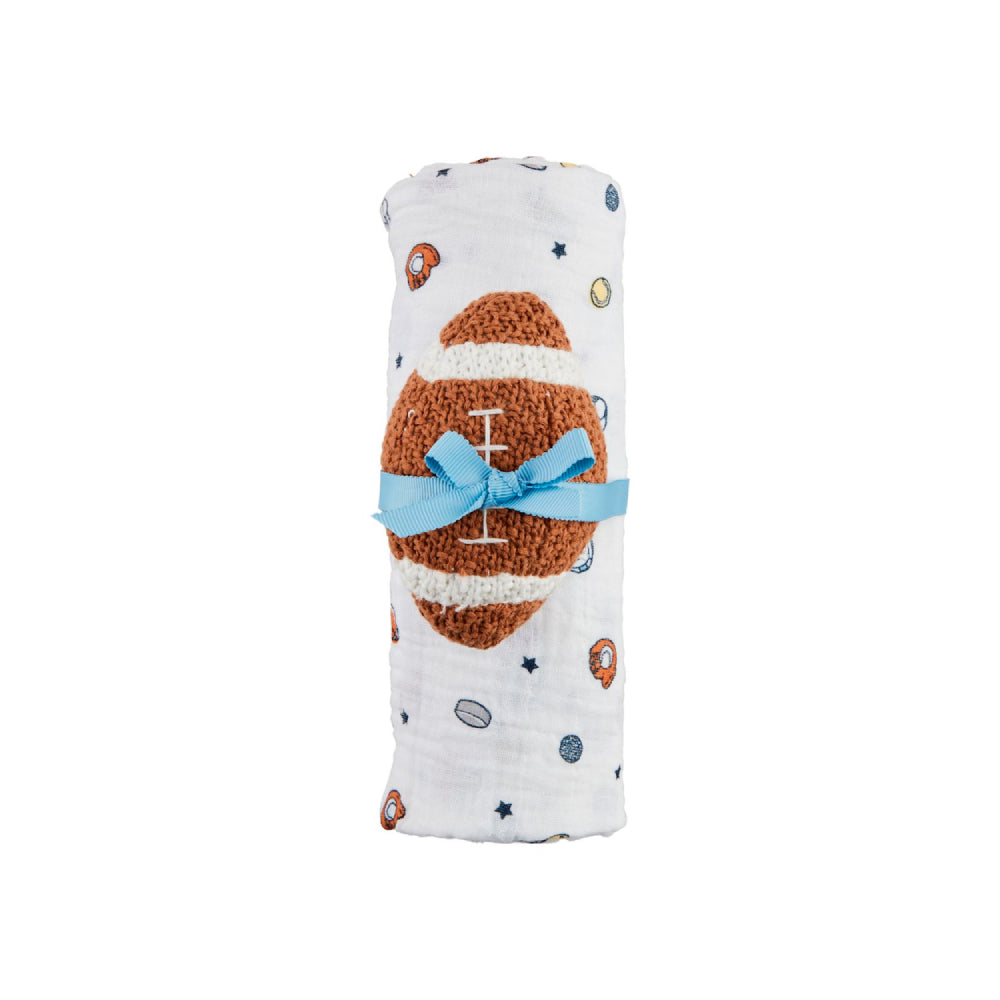 Baby blanket with football design and blue bow on a white background.