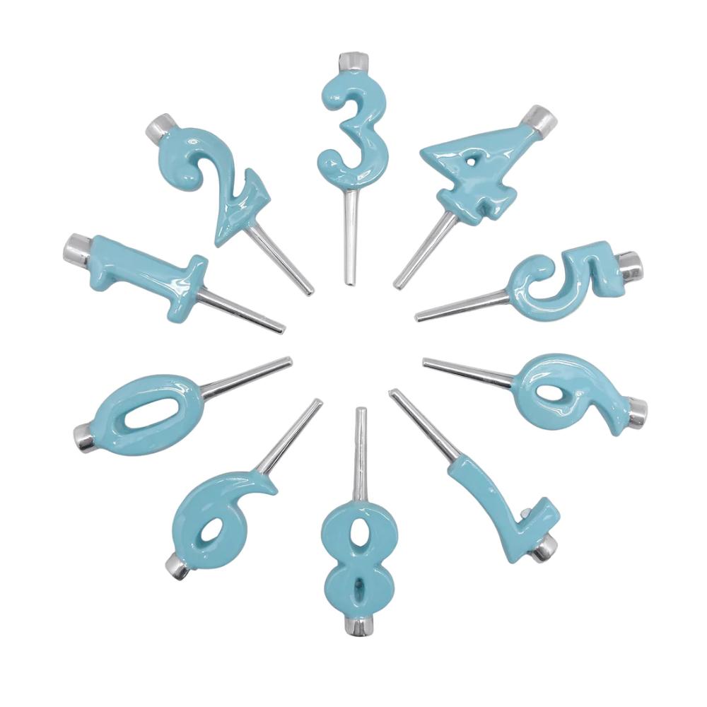 A set of blue aluminum number candle holders for cakes, arranged in a circle with each holder in the shape of a numeral from 0 to 9 on a white backround.