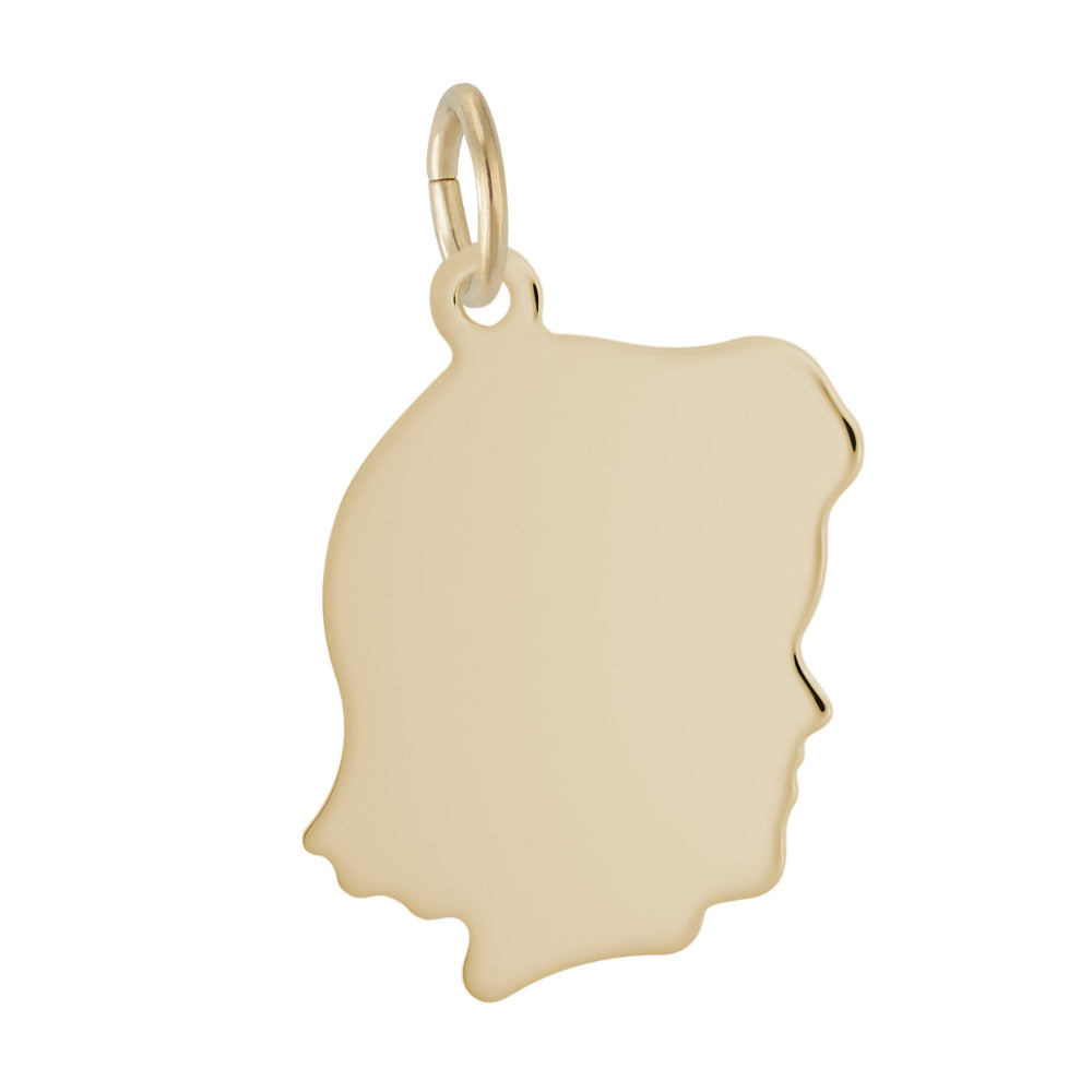 Gold pendant shaped like a face looking right on a white background