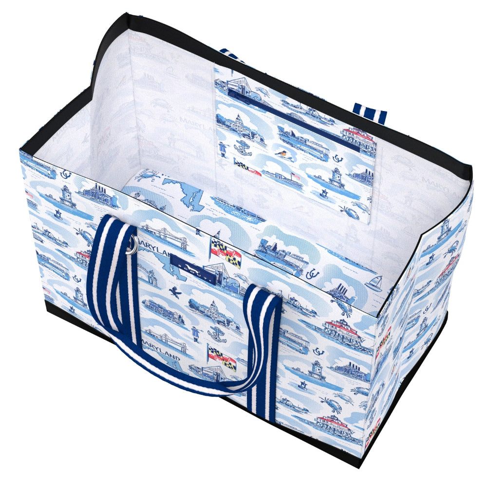 A rectangular fabric storage tote bag with a nautical print, featuring blue and white striped handles, a zippered top, and an interior organizer pocket.