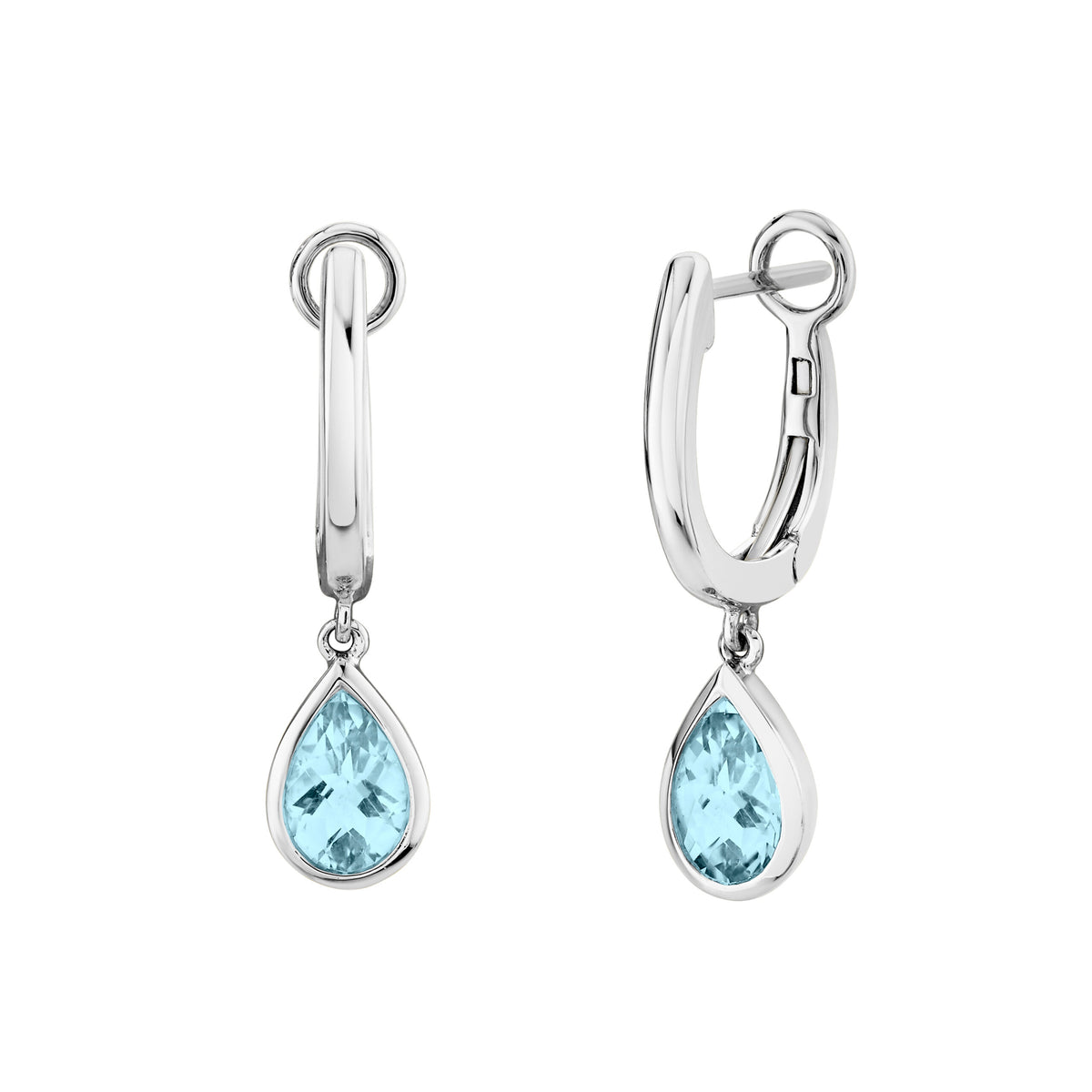 A pair of silver huggie hoop earrings with teardrop-shaped light blue gemstone drops, shown on a plain white background.
