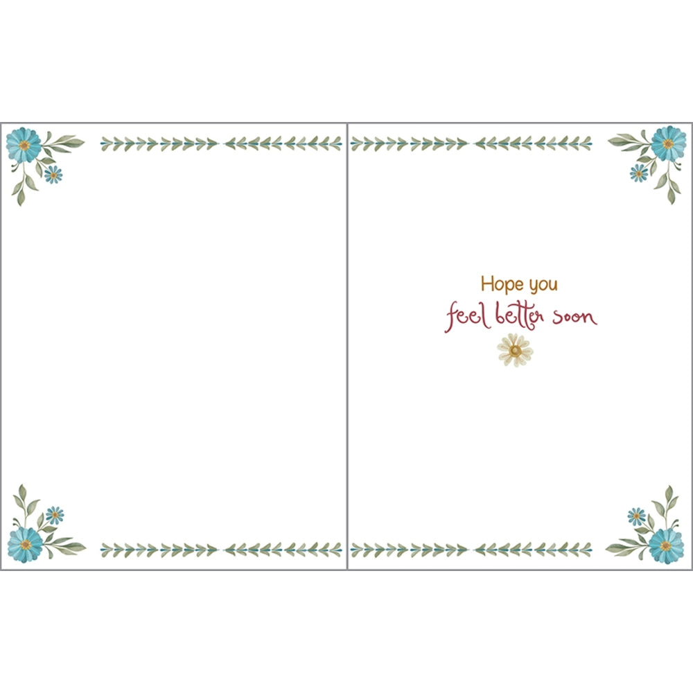 A square greeting card design with a white background, floral corner decorations in blue and green, and the printed message 'Hope you feel better soon' in brown and pink script with a small yellow flower.