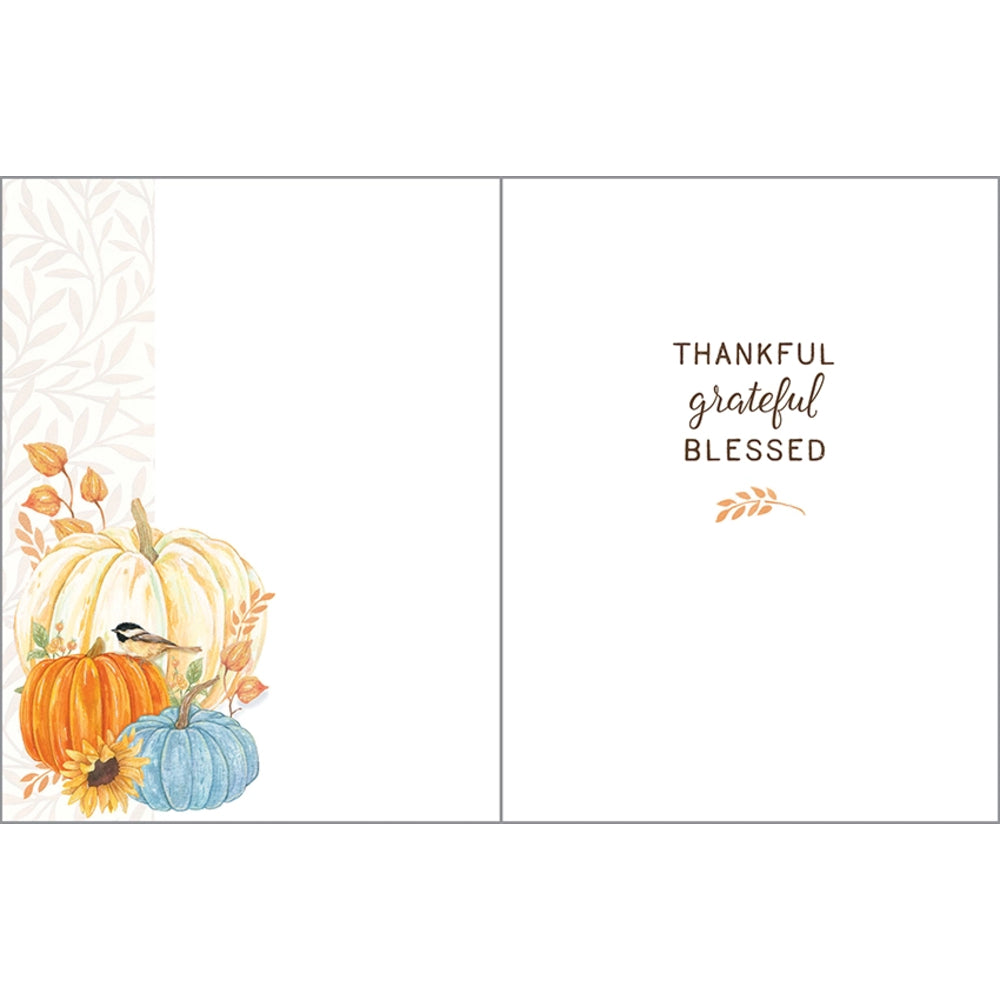 A split-view greeting card design with a watercolor autumn illustration on the left and the words 'THANKFUL grateful BLESSED' on the right, shown on a white background.