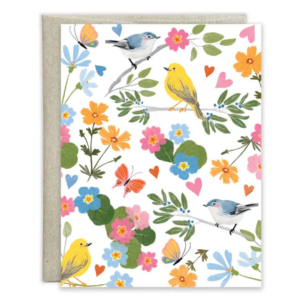 Greeting card with colorful birds and flowers on a white background
