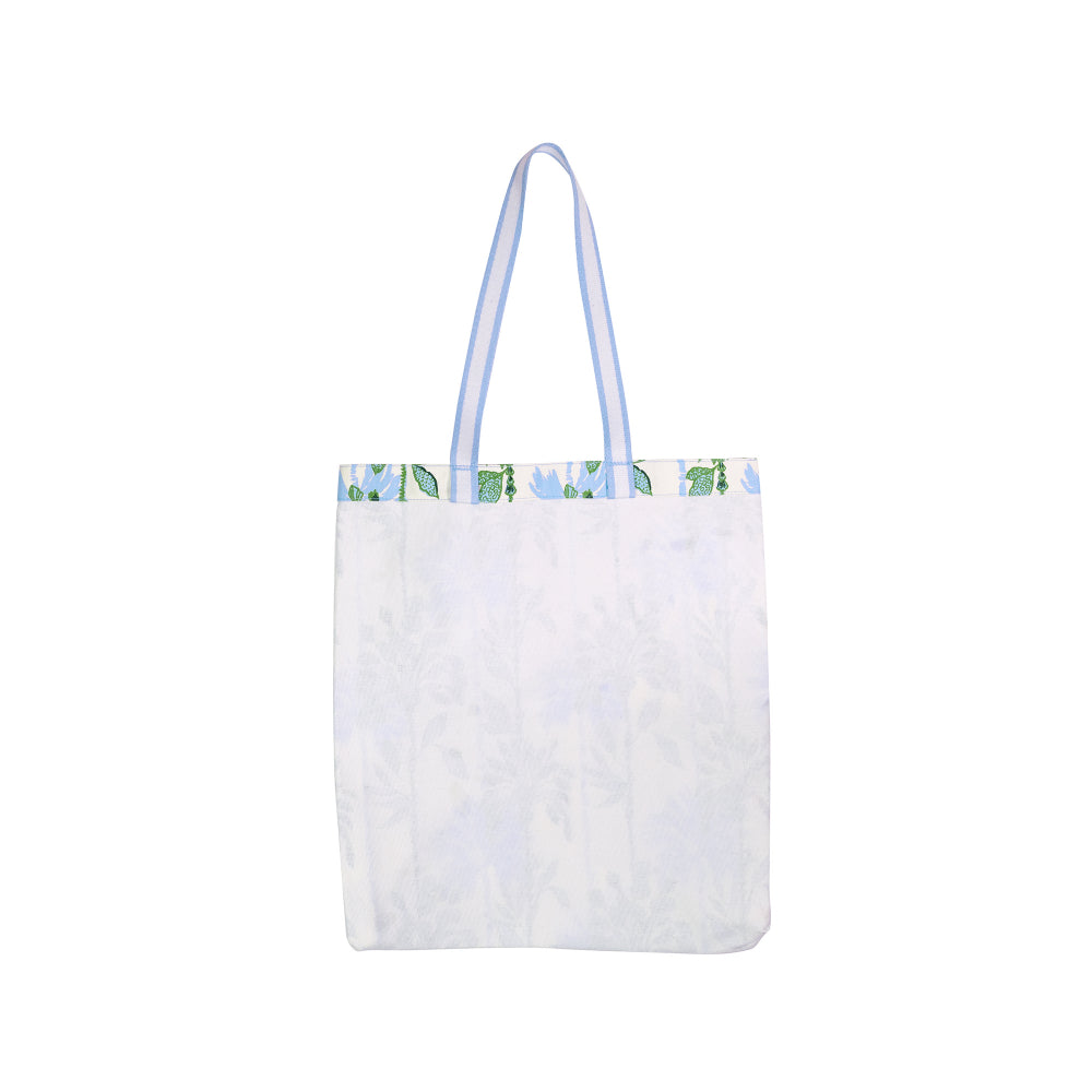 White tote bag with a floral pattern on a white background