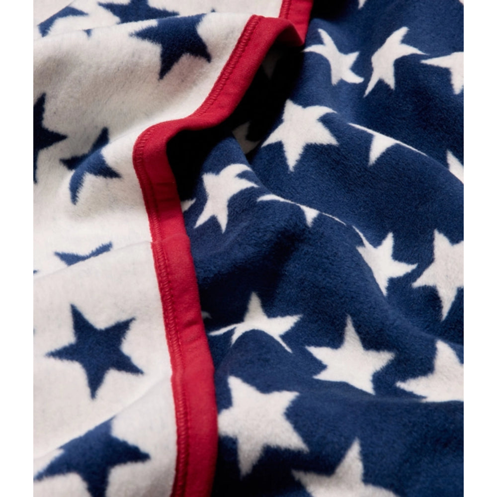 Close-up of a fabric with star pattern in blue, white, and red.