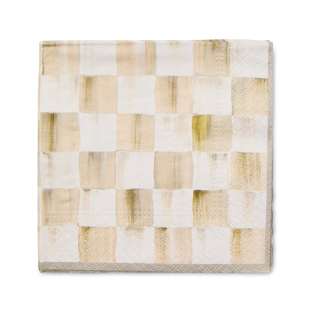 Checkered napkin in beige and white on a white background.