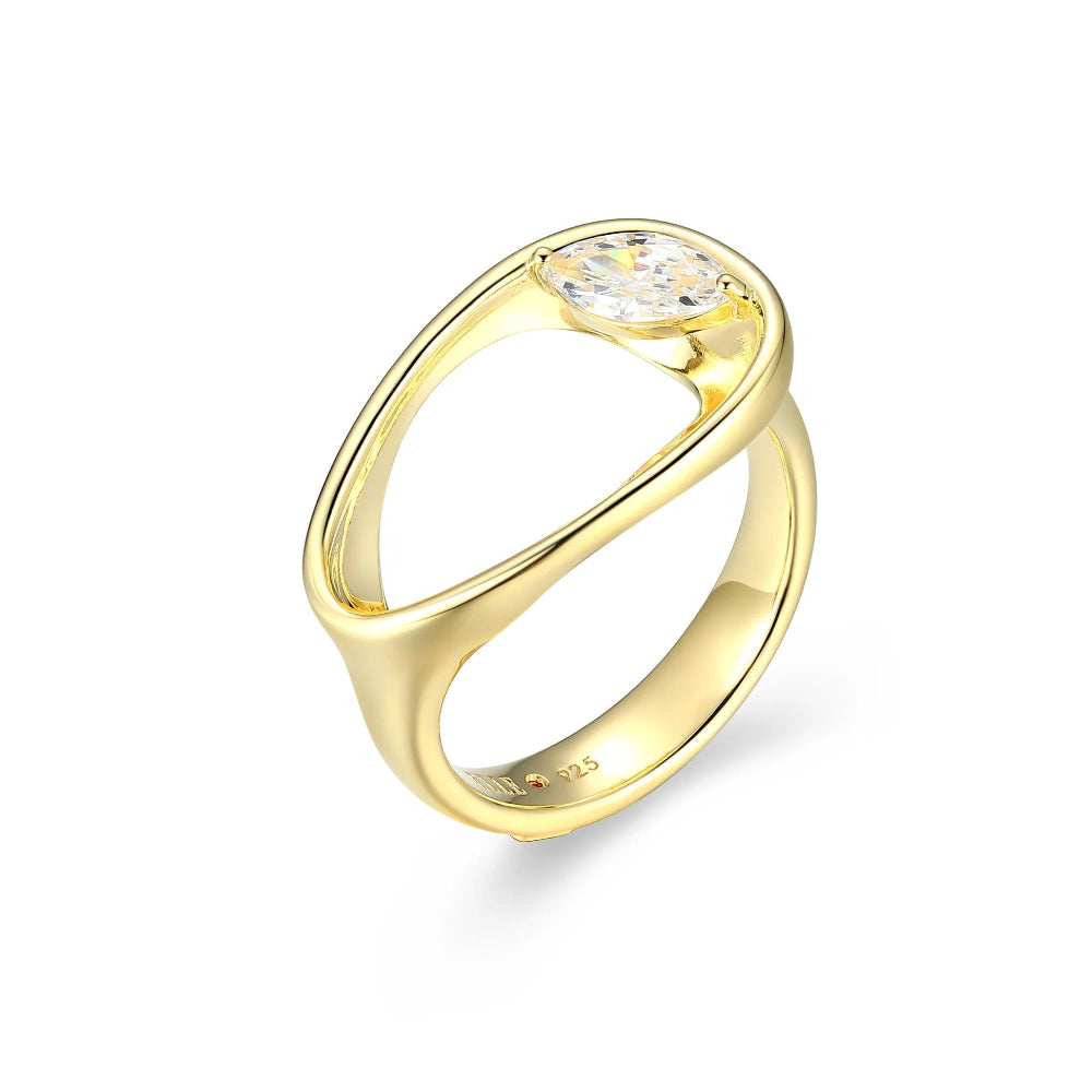 Gold tone ring with clear stone