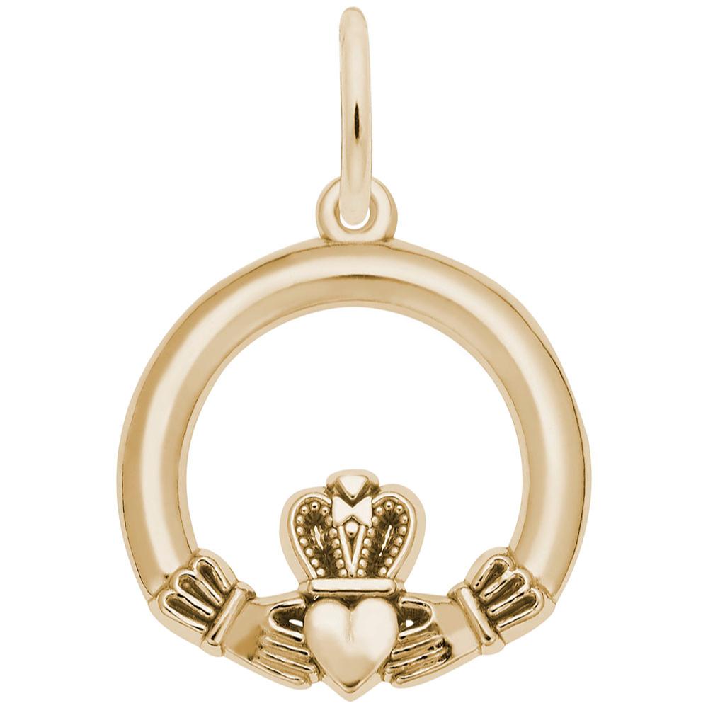 Gold Claddagh charm on a white background