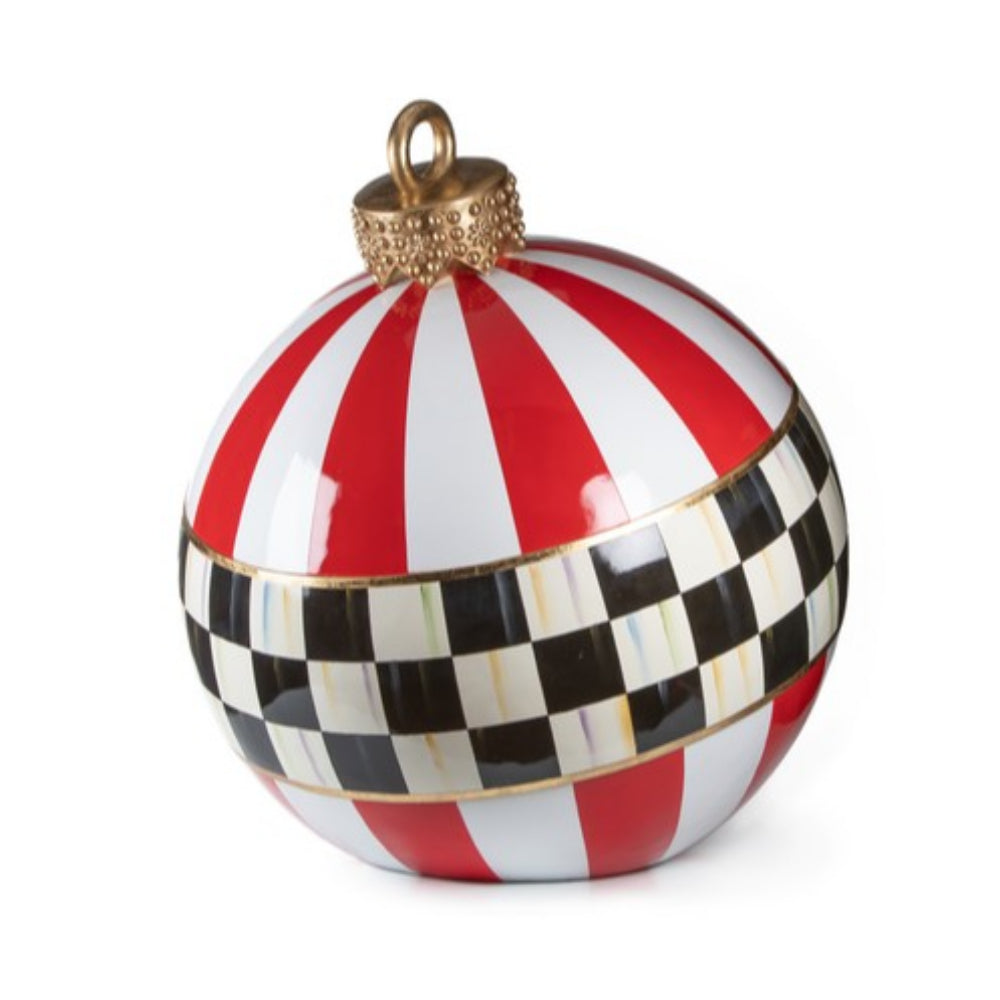 Decorative ornament with red and white stripes and black and white checkered pattern on a white background