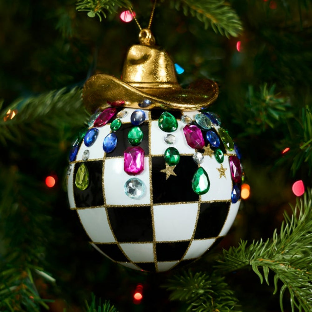 Courtly Check ornament with a gold cowboy hat on top and colorful gems on a Christmas Tree.