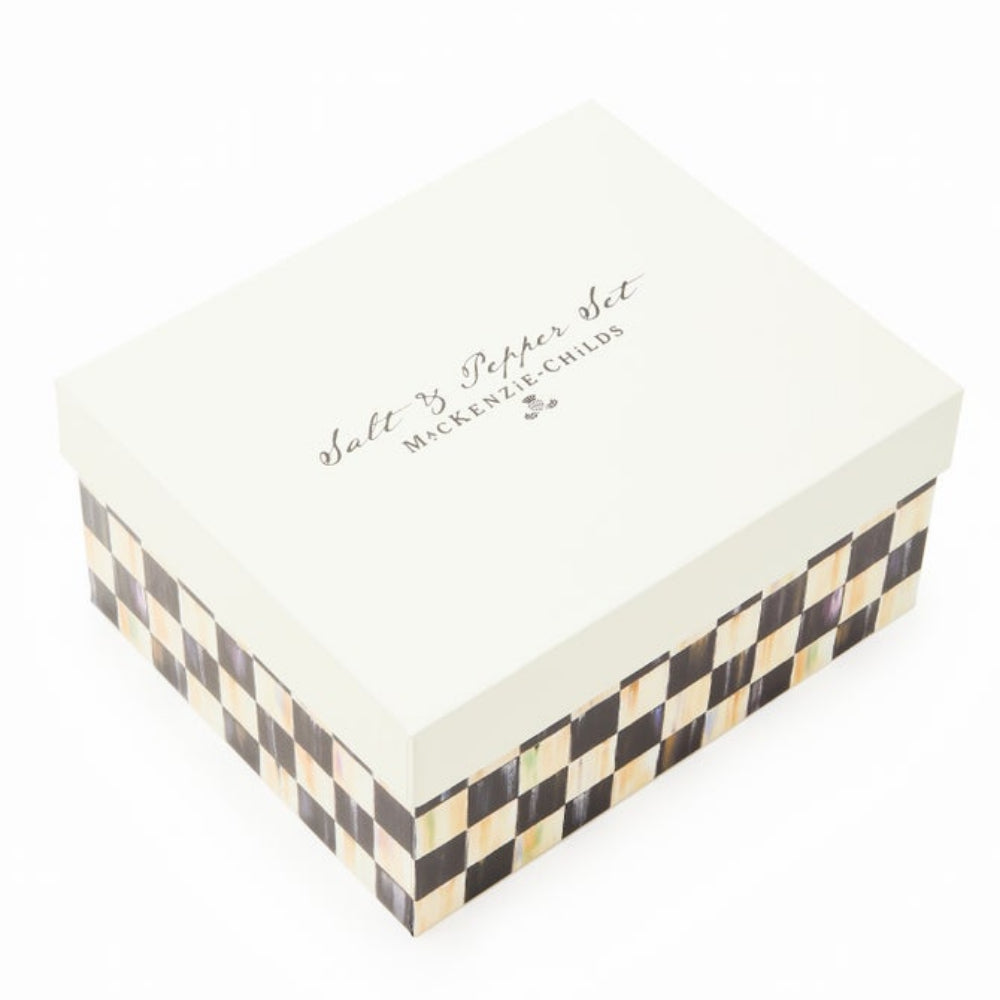 Checkered box with 'MacKenzie-Childs' branding on a white background