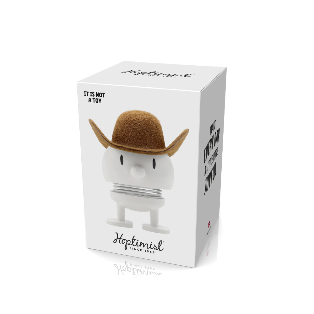 Boxed product with a character wearing a cowboy hat on a white background