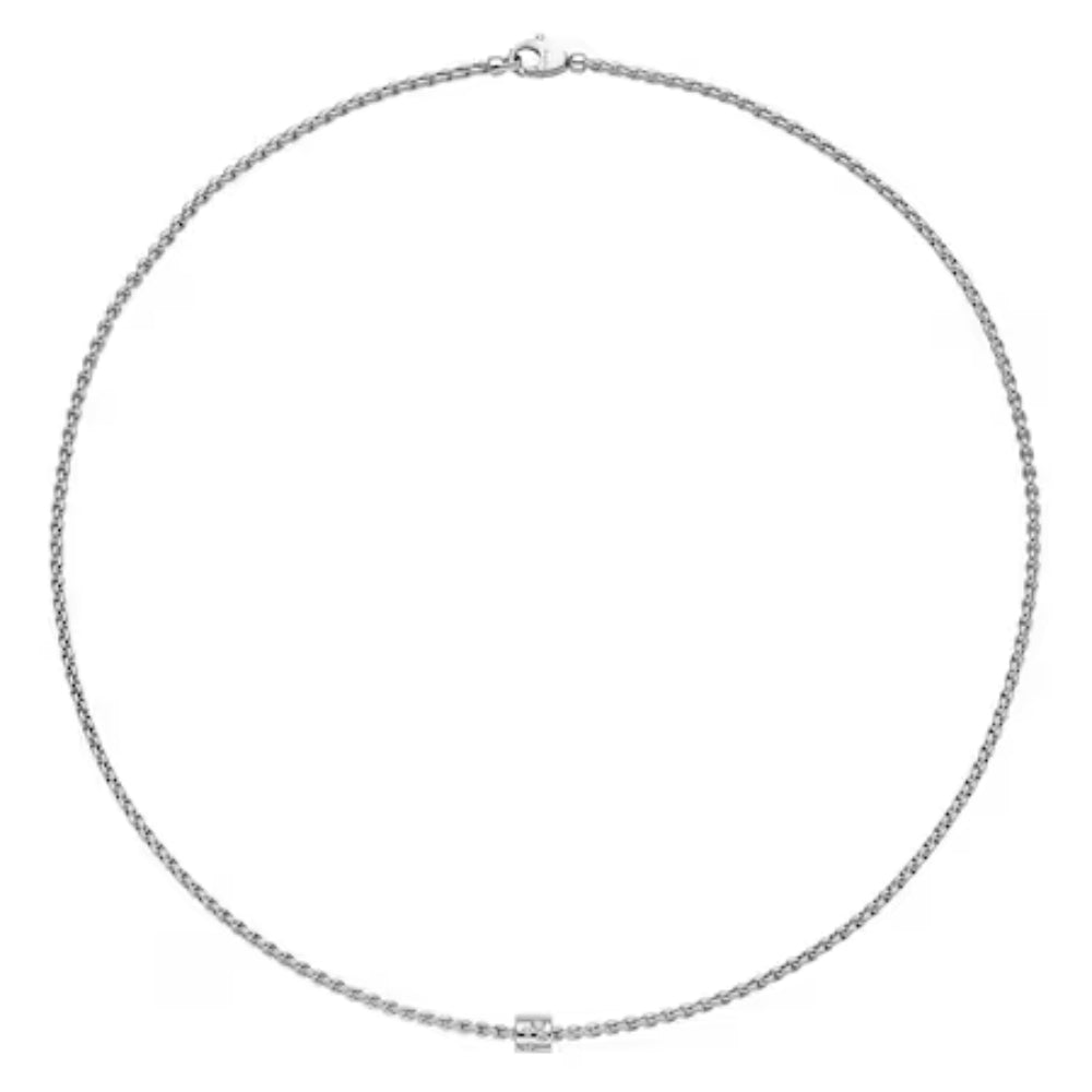 An 18k gold necklace with diamond pave, displayed on a plain background.