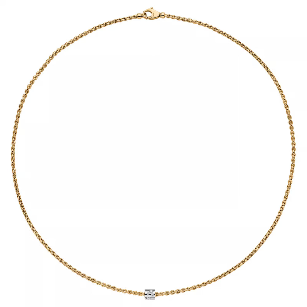 A two-tone 18k gold necklace with a diamond pavé element, displayed against a white background.