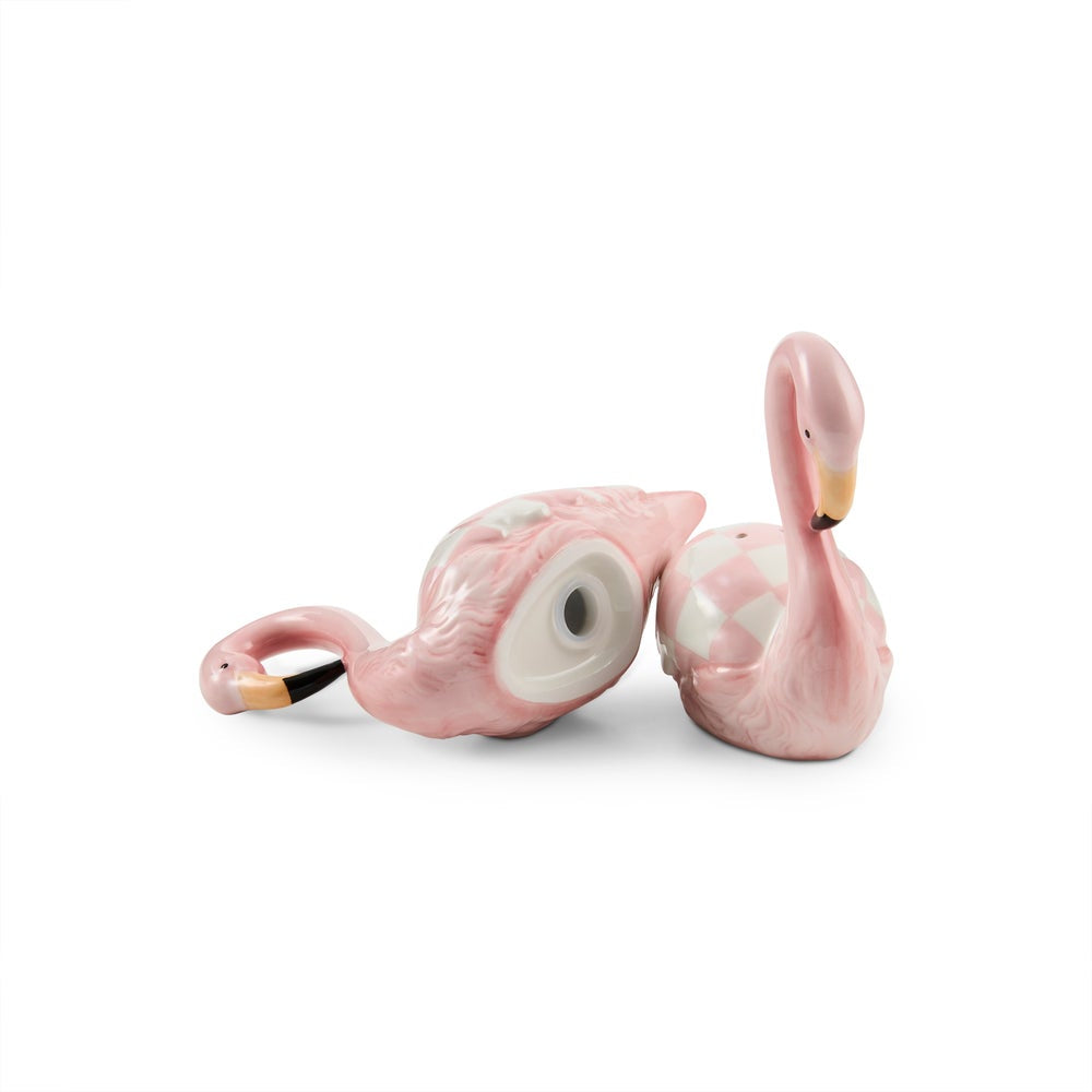 A pair of pink flamingo-shaped salt and pepper shakers on a clean white background.