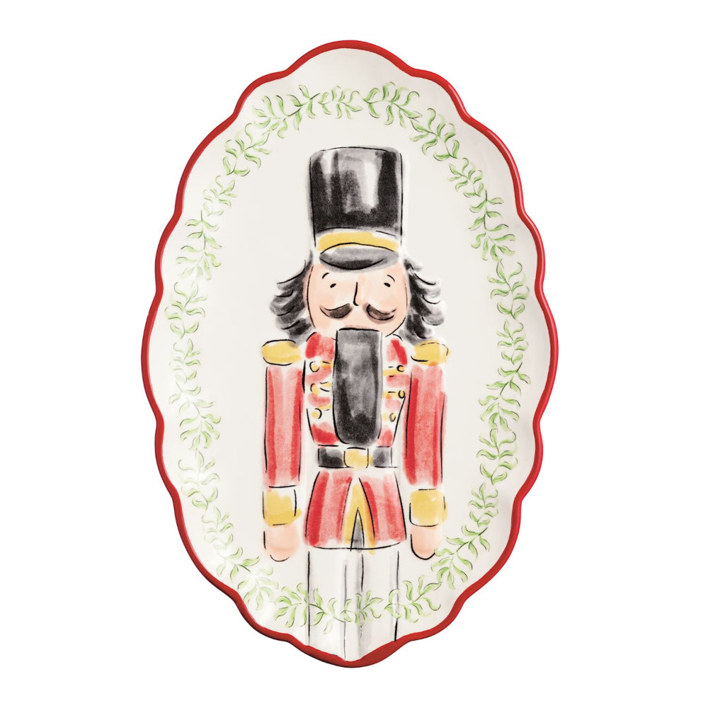 Decorative plate with a nutcracker design on a white background