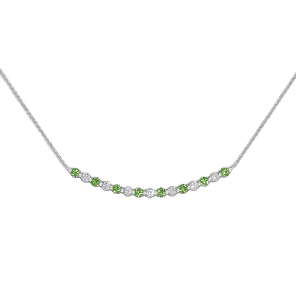 White gold peridot and diamond smile pendant necklace with small diamonds on a white background