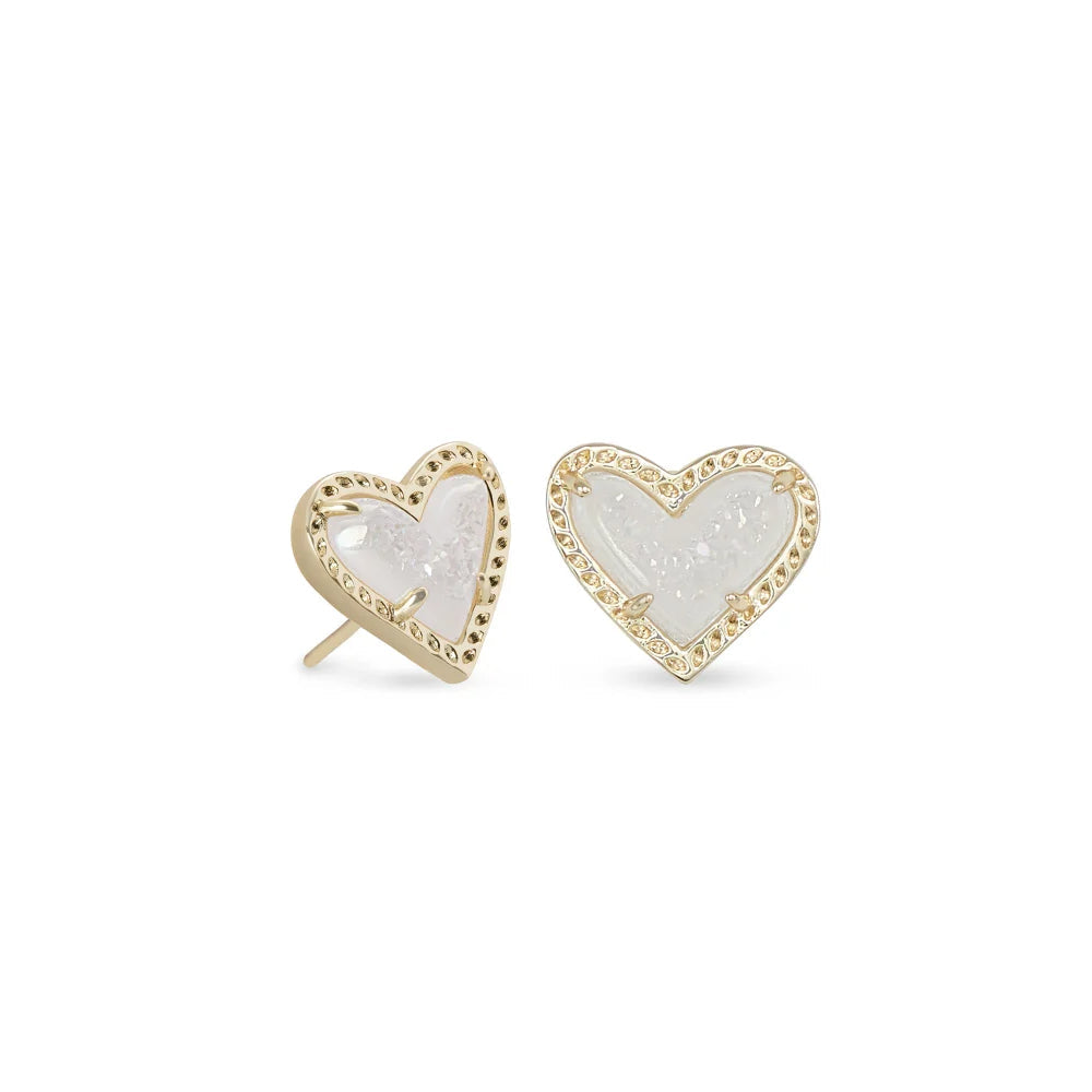 Heart-shaped earrings with gold frames on a white background