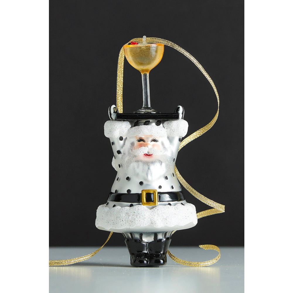 Decorative ornament of a Santa Claus figure with a cocktail glass on his head against a black background.