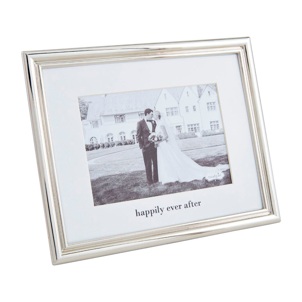 Silver picture frame with wedding couple with text "happy ever after" on a white backround.