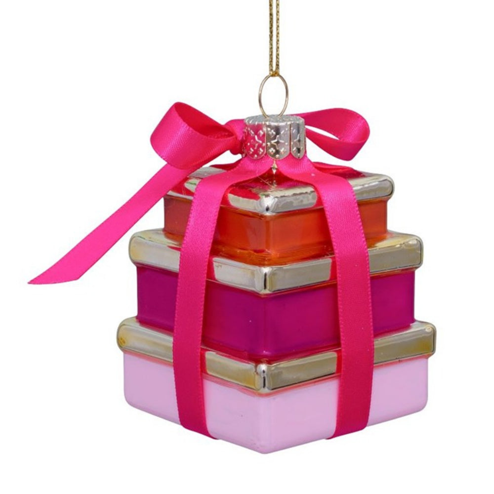 Stacked gift boxes ornament with a pink ribbon on a white background