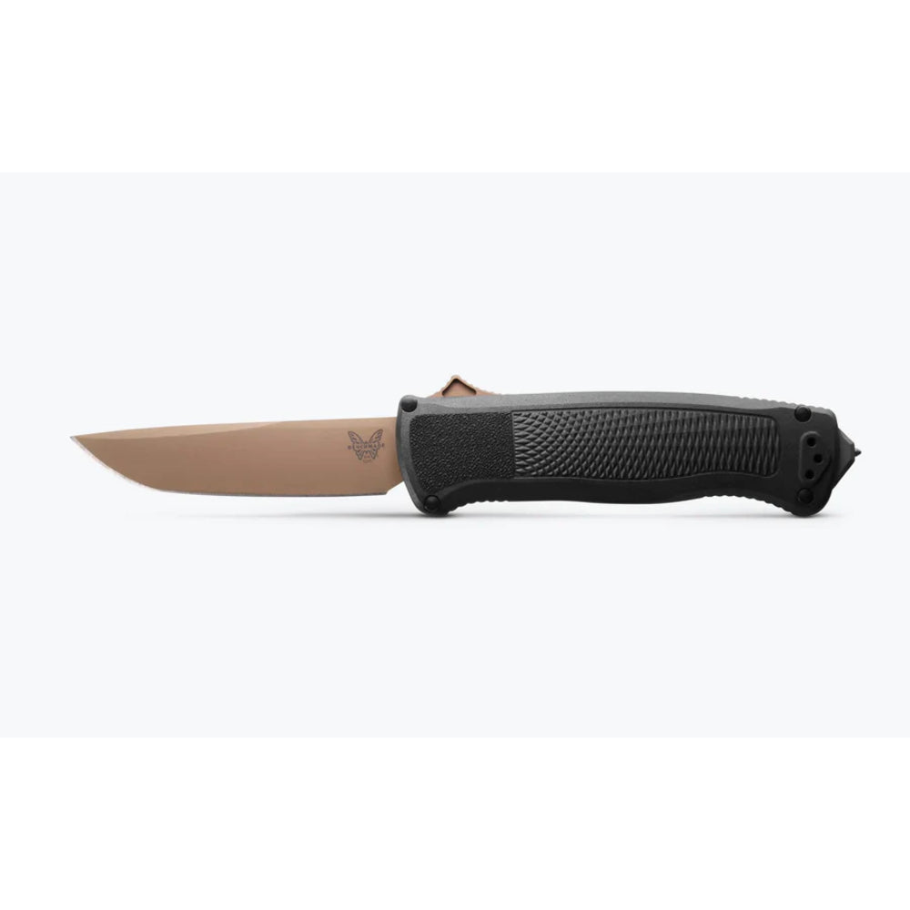 A folding pocket knife with a matte tan blade and a textured black handle, shown horizontally against a plain white background.