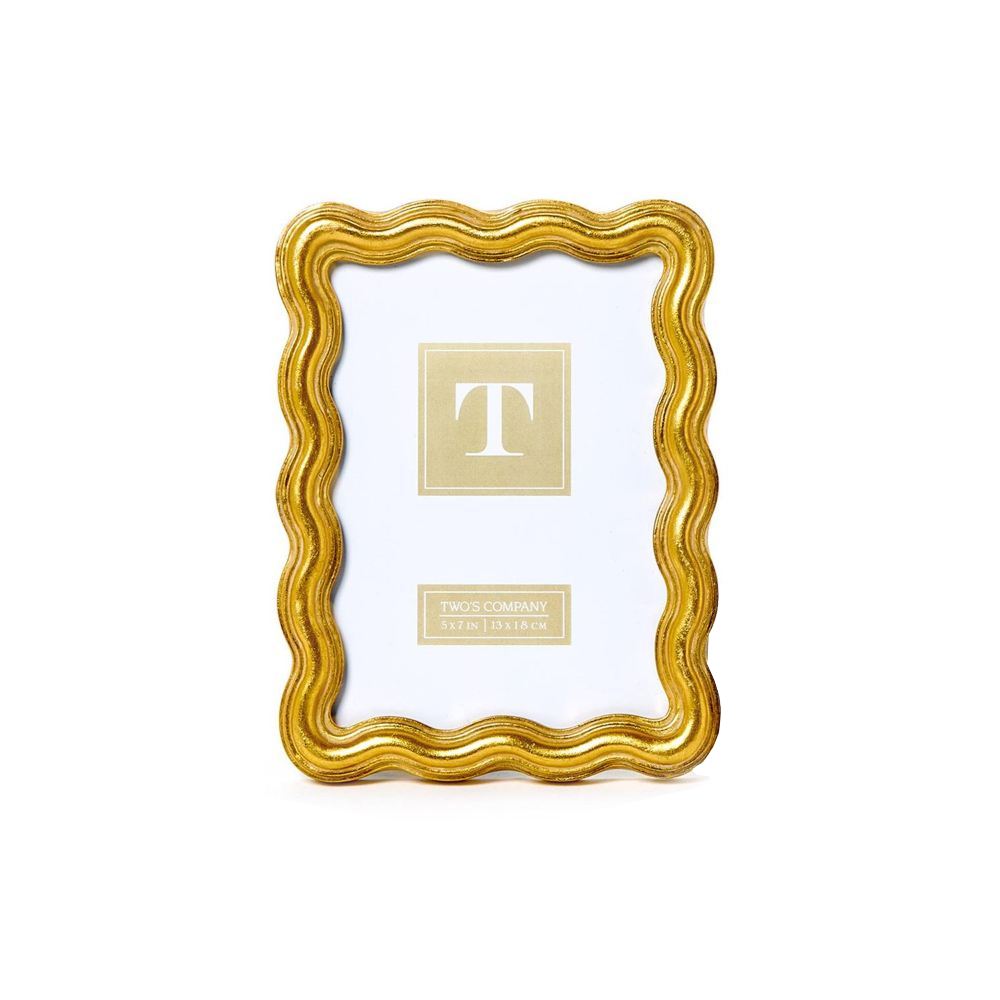 A gold 5x7 wave edged decorative frame with a white center on a white background.