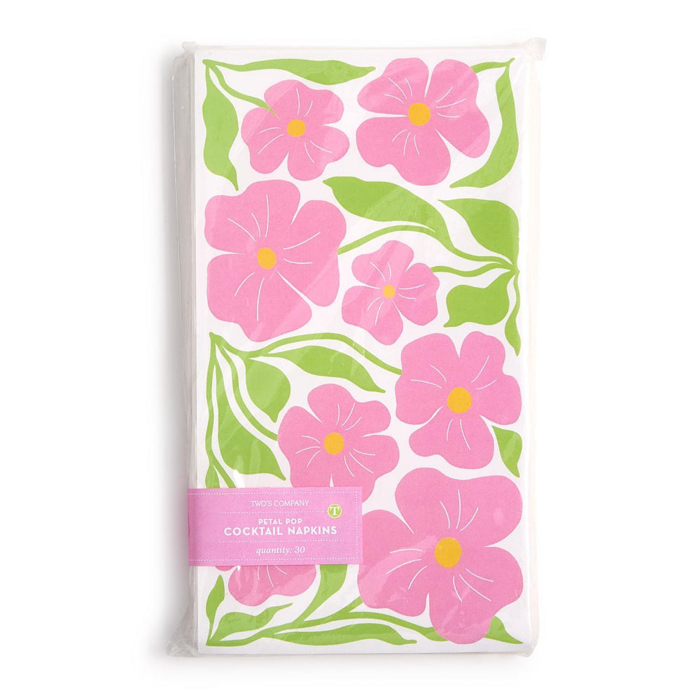 A pack of paper cocktail napkins featuring a retro floral pattern with pink flowers and green leaves on a white background, sealed in clear plastic packaging with a pink paper label.