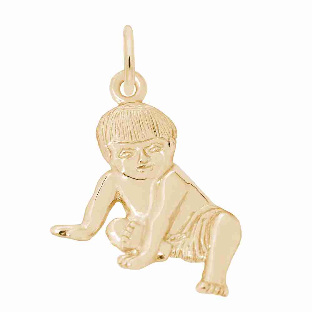 Gold baby charm on a white background