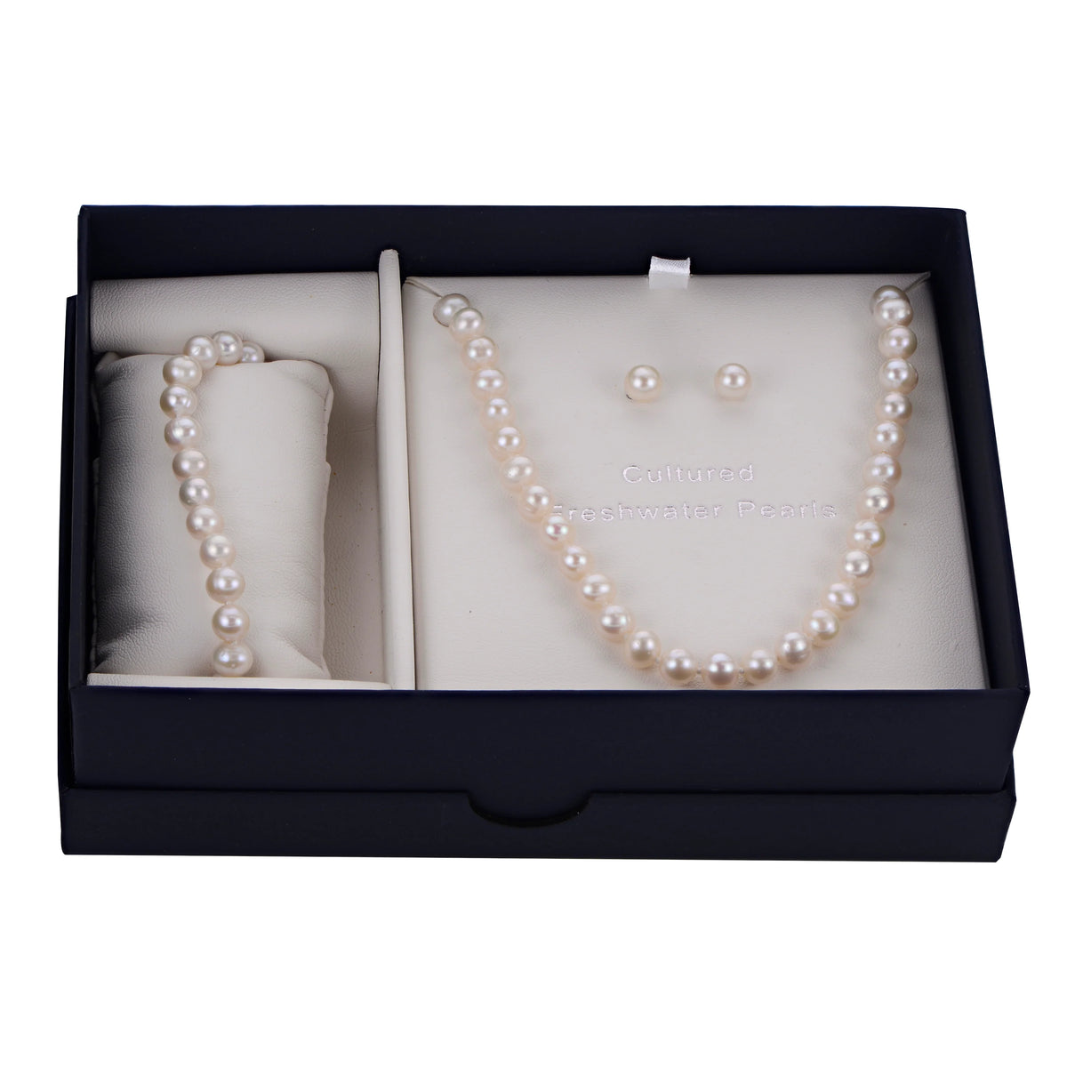 pearl strands and earrings in a blue box on a white background