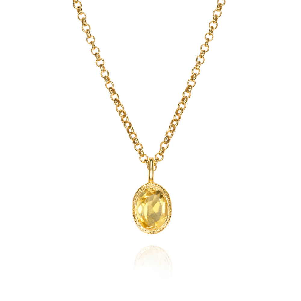 yellow stone in gold frame with yellow chain on white background