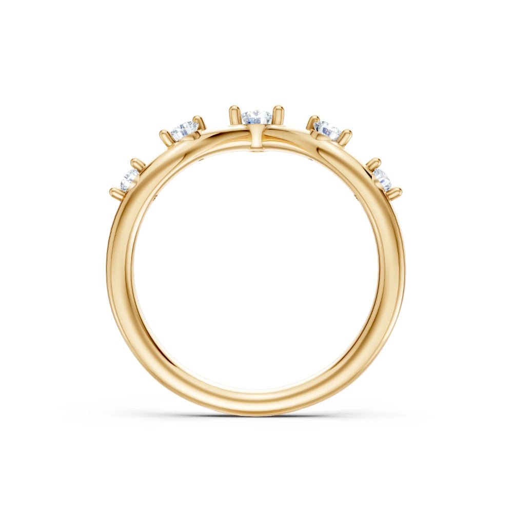 Gold ring with small diamonds on a white background