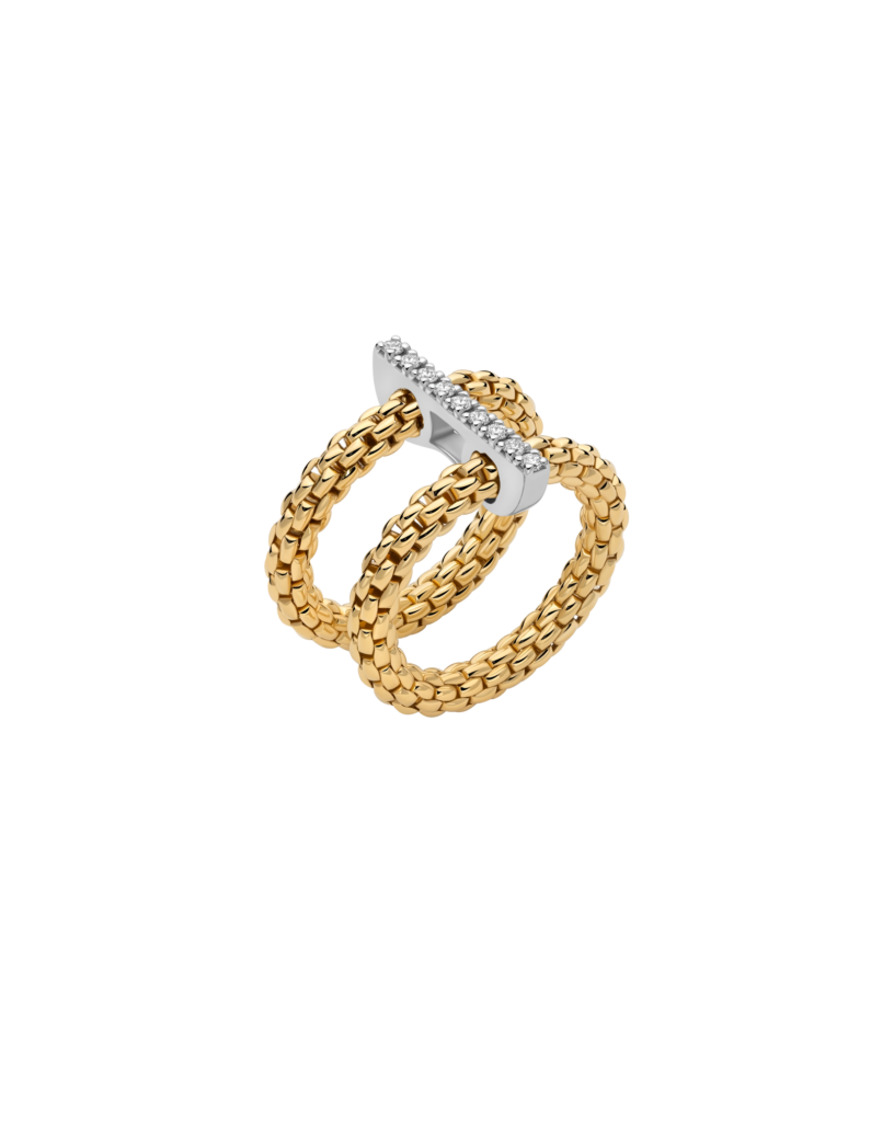 A gold and white gold ring featuring two interlocking textured rope-style bands with a polished white gold bar accented by pavé-set clear stones, shown on a plain white background.