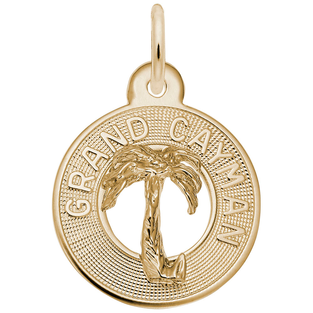 Gold disc charm with palm tree design and 'Grand Cayman' text on a white background