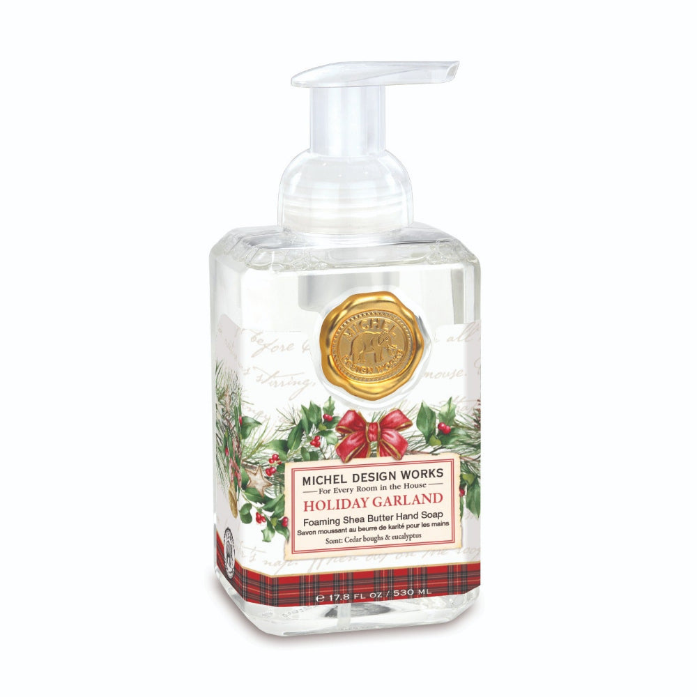 Hand soap bottle with holiday design on a white background.