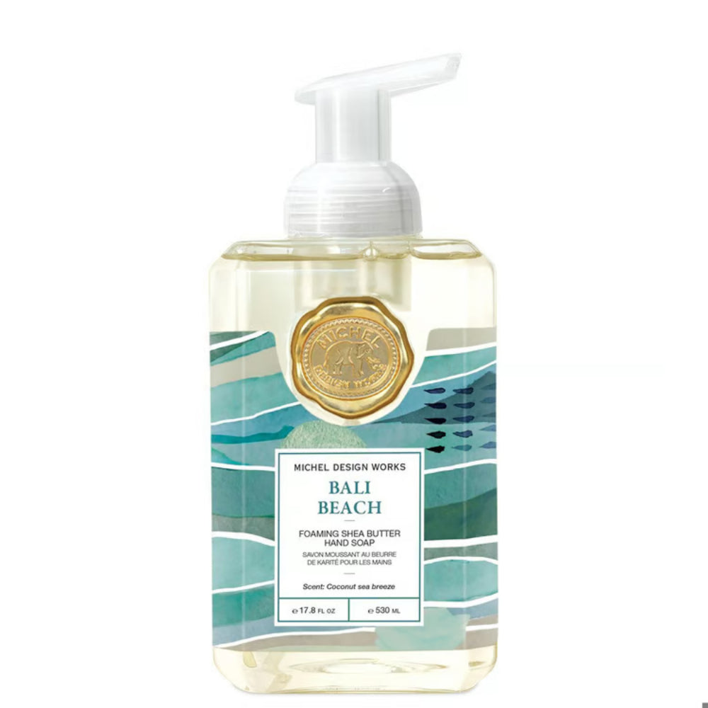 Michel Design Works Bali Beach Foaming Shea Butter Hand Soap in a clear rectangular bottle with a white pump dispenser and a teal and white geometric label.