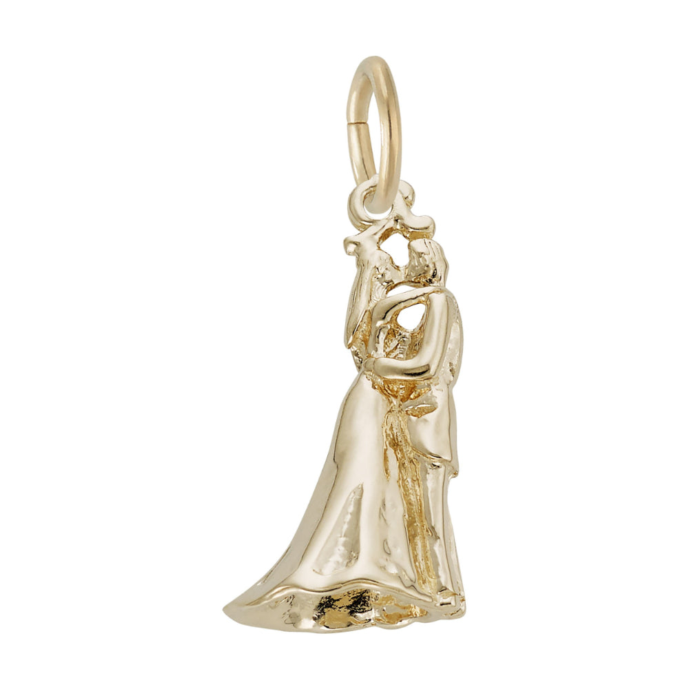 Gold charm depicting a bride anmd groom kissing with the bride facing right, shown on a white background