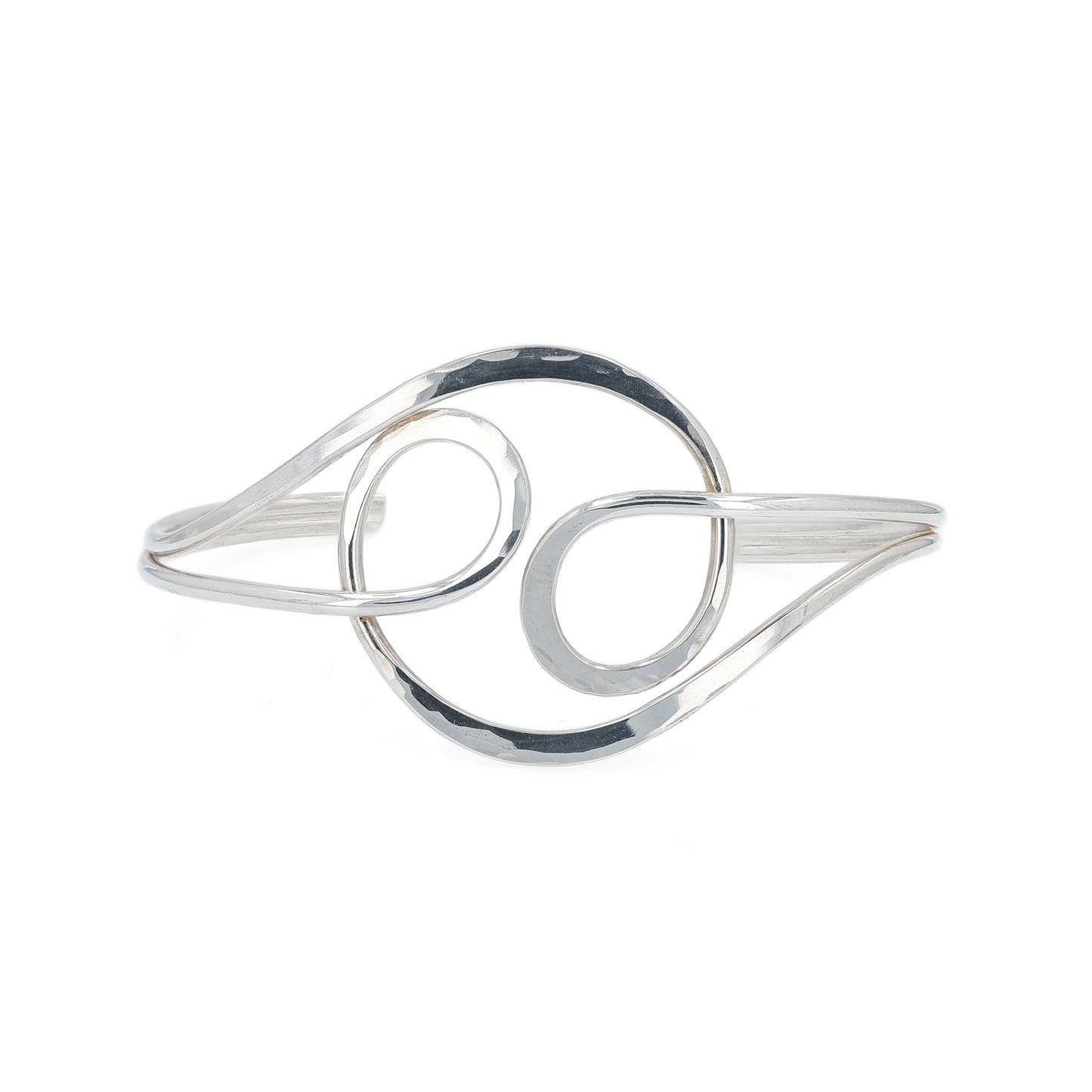 Sterling silver hammered open work angle bracelet on a white background