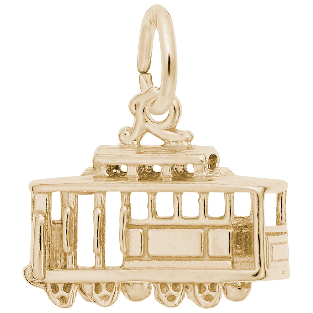 Gold cable car charm on a white background