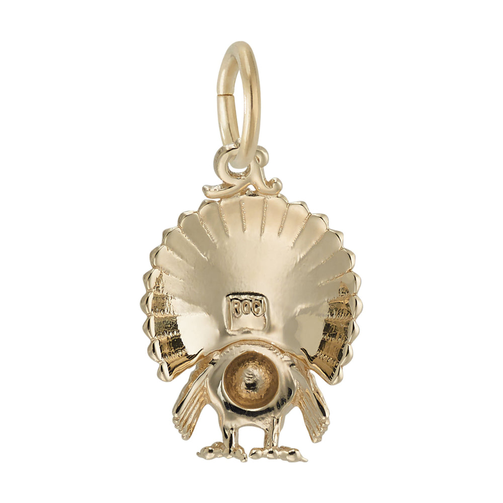 Gold Turkey Charm with detailed feathering, shown facing backward on a plain white background