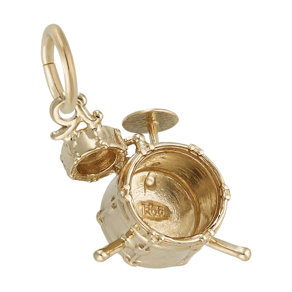 A gold drummer charm featuring a main bass drum, a smaller tom, and cymbal, shown on a plain white background.