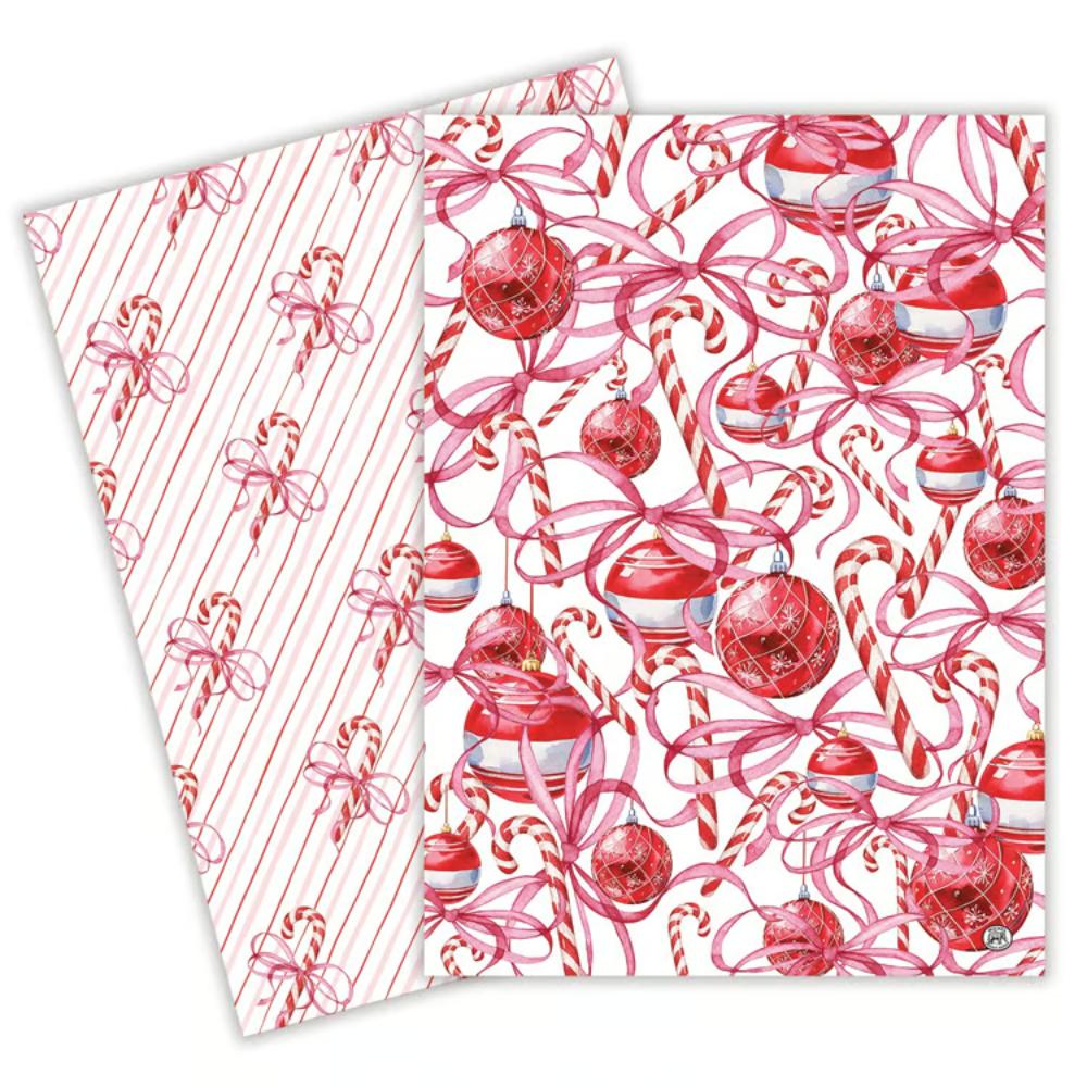 Two kitchen towels with a festive Christmas pattern, featuring red and white candy canes, ornaments, and pink ribbons on a white background.